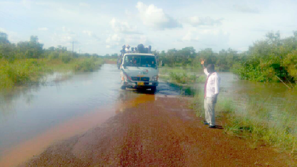 The flooded Mpaha-Mpaha Junction-Buipe road.