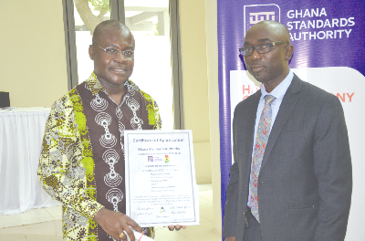 •Prof. Dodoo, GSA Director-General (left) and Dr Akwasi Achampong, GSA Board Chairman after receiving a certificate of accreditation from Daaks, a German Accreditation Agency.