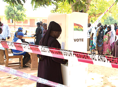  A voter casting her vote
