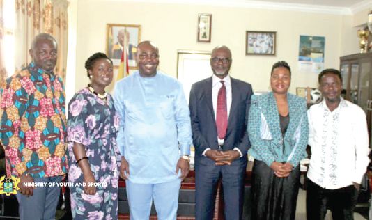 Members of the Normalisation Committee with the Minister of Youth and Sports, Mr Isaac Asiamah (3rd left), and his deputy, Mr Perry Okudzeto (left)