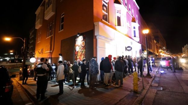 Customers queued outside Tweed in St John's as midnight approached