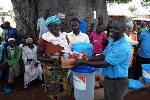 World Vision provides relief items to flood victims