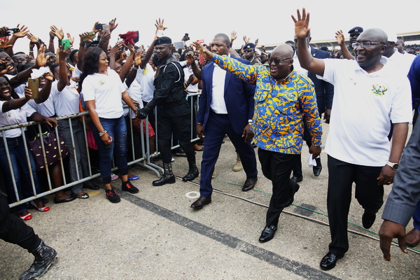 President Akufo-Addo and Vice President Dr Bawumia responding to cheers from the graduates after the ceremony.