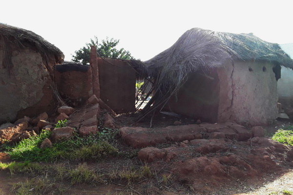 Some of the collapsed houses and farmland destroyed by the floods at Kukobila