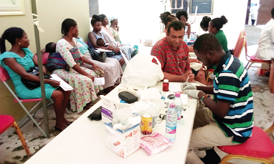 The Kasoa Area Manager of Asa Savings and Loans Limited, MD Serazus Sieathin going through the health screening.