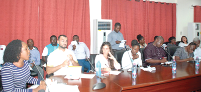Ms Alberta Nana Akyaa Akosa of MoFA addressing the exhibitors at the meeting