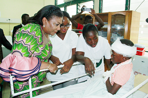 The First Lady, Mrs Rebecca Akufo-Addo, speaking to one of the victims