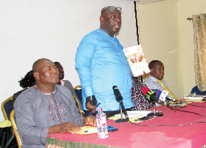 Mr Joshua Ansah (standing),Deputy Secretary General of TUC  launching the  Elderly Care book in Accra.Picture:ESTHER ADJEI