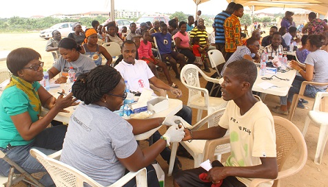 Some participants undergoing the screening process. 