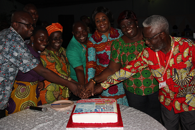 Ms Ajoa Yeboah-Afari (3rd left), a Board Member of the GCGL being assisted by Mr Ransford Tetteh (4th right), Acting Managing Director, Graphic Communications Group Limited, Mrs Mavis Kitcher (3rd right), Acting Director, Newspapers, Mr K.K. Inkoom (right). Acting  Editor, Daily Graphic and other staff to cut the anniversary cake. Pictures: EDNA ADU-SERWAA