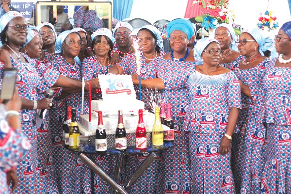  Deaconess Rose Mankralo (3rd left), the Chairperson, and her leadership cutting the 10th anniversary cake