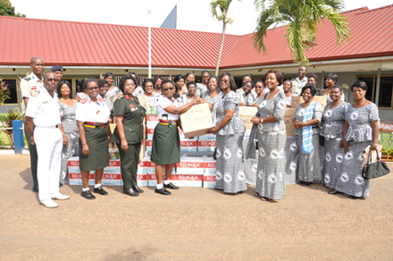 The President of the Accra East Grand Ladies Auxiliary Knights of St John International, Mrs Belinda Dogbatse (left) handing over the items to a Matron with the 37 Military Hospital, Colonel Annie Djokoto (right)