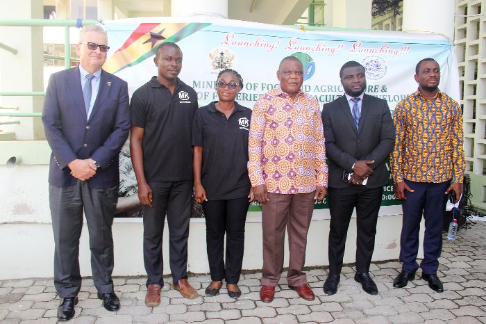 Dr Gyiele Nurah (3rd right), Minister of State in charge of Agriculture, and Mr Kennedy Osei Nyarko (right), Deputy Minister of Agriculture, with officials of GHACEM, Motor King Limited and Ghana Ports and Harbours Authority at the presentation ceremony. Picture: EDNA ADU-SERWAA