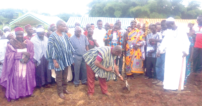 Mr Okyere Agyekum cutting the sod for the commencement of  work on the six unit classroom block in his constituency