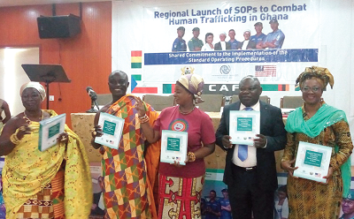 From left: Nana Eyiaba, Nana Ayimedu, Nana Awindor, Mr Adjei Baffoe and Dr Zakaria displaying copies of the document after the launch
