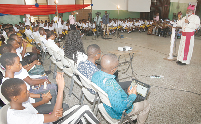 Most Rev. Gabriel Charles Palma Buckle  speaking to children 