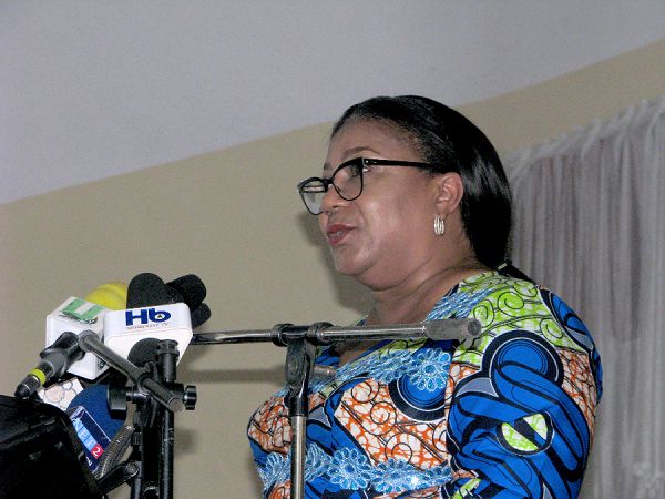 The First Lady, Mrs Rebecca Akufo-Addo (right) addressing the students at the programme.