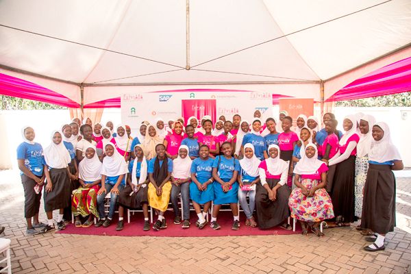 • The participants in a group photograph.