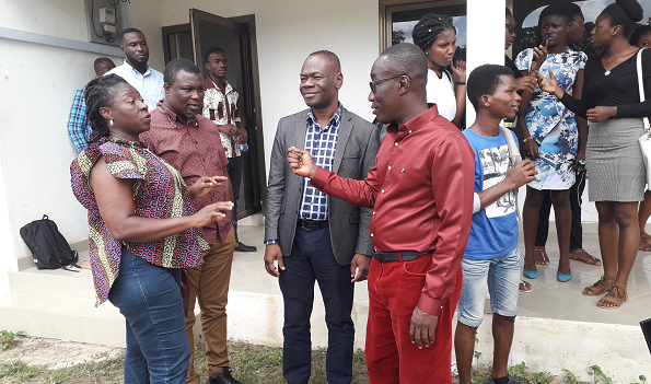 Mr Eric Amaning Okoree (right) interacting with Dr Ampadu Ameyaw (2nd right), Mr Davies Korboe (2nd left) and Mrs Ama Kodum Agyeman (left), a journalist 