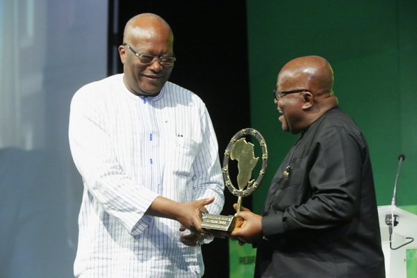 President Akufo-Addo receiving the award from President of Burkina Faso, Roch Marc Christian Kabore