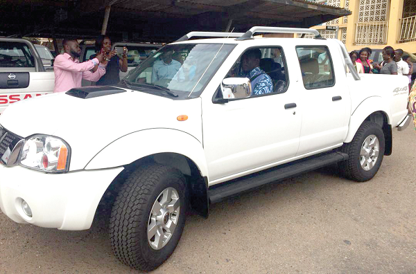  The Minister of Employment and Labour Relations driving one of the vehicles donated to the Department of Factories Inspectorate