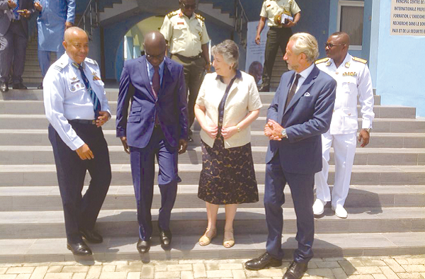  Mrs Christine Evans-Klock (2nd right), the UN Resident Coordinator interacting with Mr Dieng (3rd right), Mr Hammargren (right) and Air Vice Marshall Evans (3rd right) after the lecture. Picture: Nana Konadu Agyeman