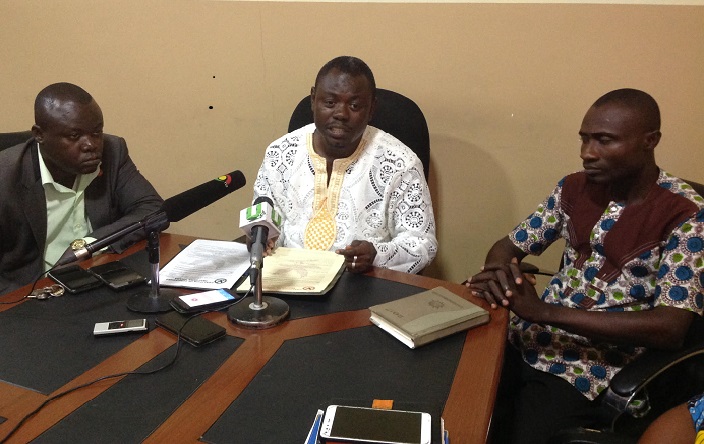 Mr Awudu (middle) addressing the concerns of members of the teachers coalition