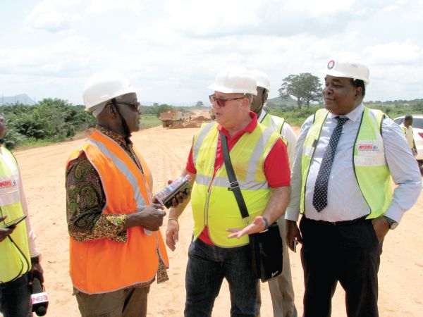  Portions of the Tema-Akosombo railway line under construction. Inset: Mr Richard Diedong Dombo (left) interacting with Mr Vdai Veer Singh (right). Picture: ESTHER ADJEI 