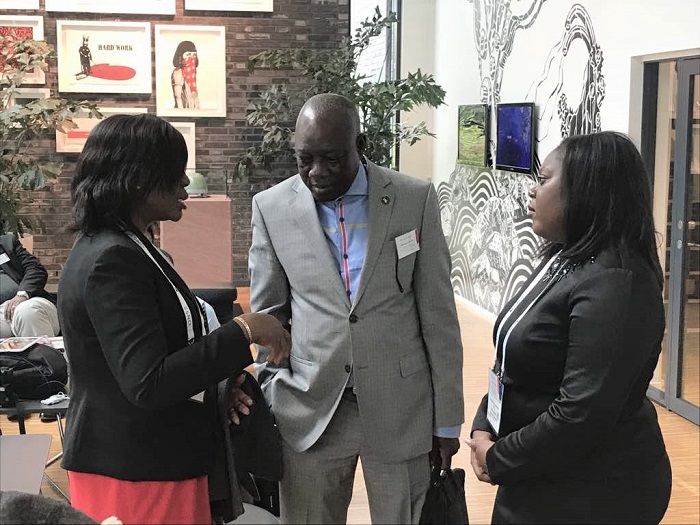 Mr Apaalse interacting with Mrs Alice Torkokoo of GPHA left and Dr. J. Noonoo a member of Ghana delegation to ONS 2018