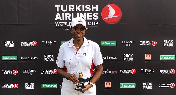Lady Captain of the Celebrity Golf Club, Helen Appah with her trophy