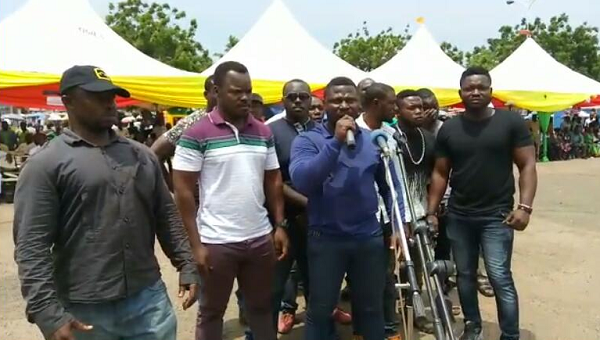 FLASHBACK : Members of the Invisible Forces take their turn to ask a question at the Tema Town Hall meeting