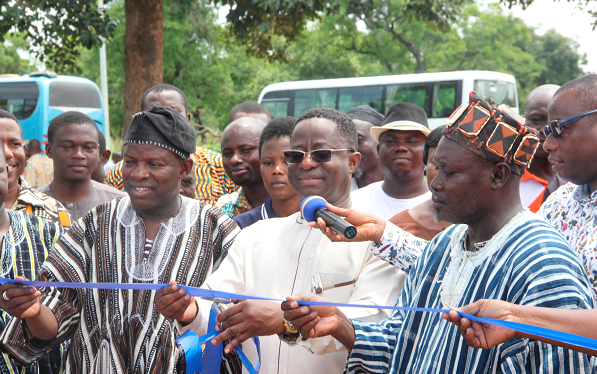 Mr John Peter Amewu (3rd left), Minister of Energy, turning on the switch to commission the 26 Micro-Grids Solar PV at Langatre CHPS at the West Gonja District in the Northern Region. Looking on are Mr Jibril Mawuzu Saeed (left), DCE of West Gonja District and Mr Salifu Saeed (2nd left), Northern Regional Minister. Picture: Maxwell Ocloo