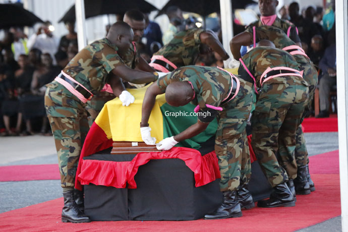 After the casket was taken from the airplane, the UN flag draping it was removed and a Ghanaian flag used to drap it. PICTURES BY EMMANUEL QUAYE AND SAMUEL TEI ADANO