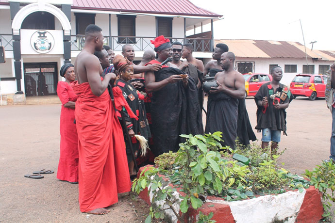 The Banmuhene, Nana Kwame Afari Bampo II,(middle) pouring libation to announce the end of the Adae (Adaebutu) at the forecourt of the Omanhenes palace at Akropong on Monday September 10. Looking on are some of the elders of Akuapem