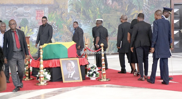 Some dignitaries filling past the casket of Kofi Annan at the Accra International Conference Centre