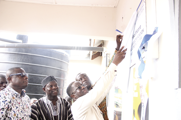 Mr John Peter Amewu (3rd left), Minister of Energy, unveiling the plaque to commission the Langatre CHPS at West Gonja District. Looking on are Mr Jibril Mawuzu Saeed (left), DCE of West Gonja District and Mr Salifu Saeed (2nd left), Northern Regional Minister.  Picture: Maxwell Ocloo