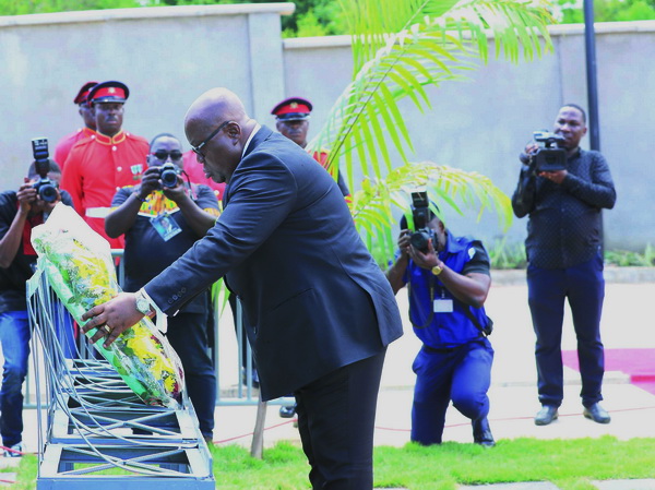 President Akufo-Addo laying a wreath on behalf of the Government and people of Ghana