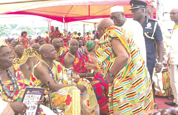 Dr Letsa exchanging greetings with Togbe Afede