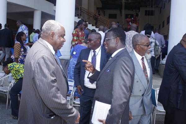  Dr Michael Opong-Kusi (3nd right), the Chairman of  the African Partner Foundation, interacting with Prof. Francis Abantanga (left), of  the University of Development Studies at the conference in Accra. Those in the picture include Professor Jacob Plange-Rhule, Rector, Ghana College of  Physicians and Surgeons, and other officials. Picture: Gabriel  Ahiabor