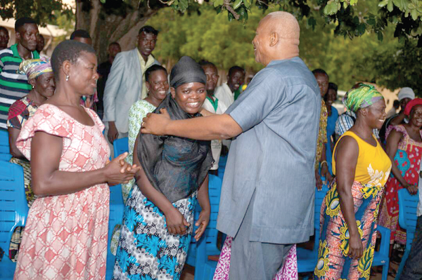 Prof. Alabi interacting with potential delegates after addressing them as part of his tour of the Upper West Region.
