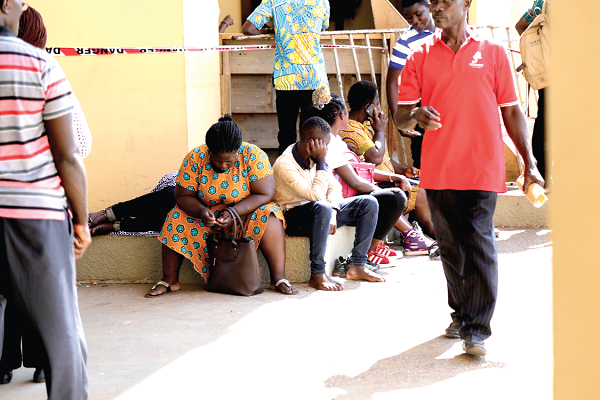 Anxious parents waiting at the Black Star Square to have their problem with school placement solved for their wards. Picture: EMMANUEL ASAMOAH ADDAI