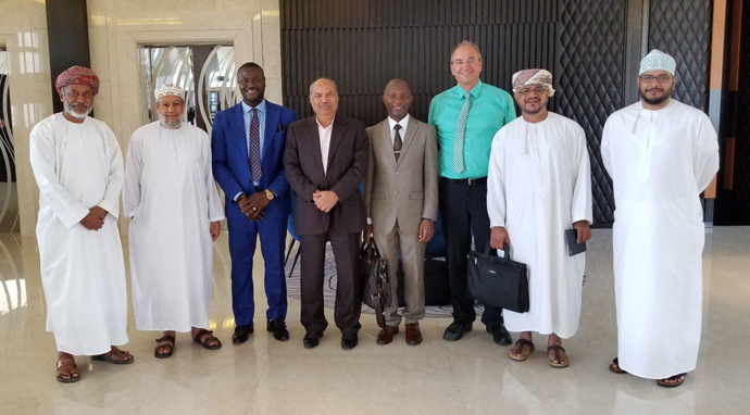 Dr. Owusu Kizito, Chairman/CEO of Investigroup ( 3rd from left) with Dr. P Mohamed Ali ( fourth from left) - A multi-billionaire industrialist and Chairman of MFAR Group of Companies), Dr. Peter Ikre, CFO of Investigroup, Christian Piendl- German Consultant, Humaid Al Habsy- Investigroup's local representative, Mohiudin Mohammed Ali, VP of GALFAR. First and second from left include Ahmed Al Habsy and Dr. Salim.