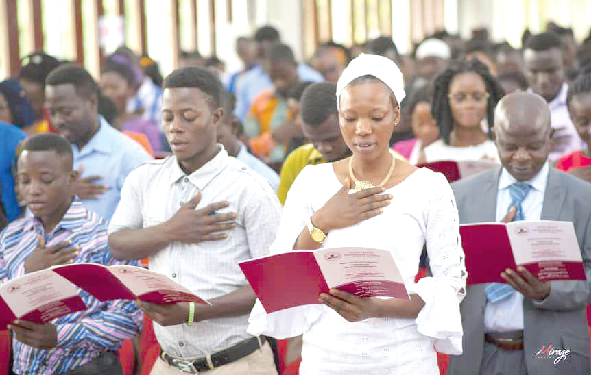 Some allied health graduates taking an oath during  the induction and oath-swearing ceremony at the Kwame Nkrumah University of Science and Technology (KNUST) in Kumasi over the weekend