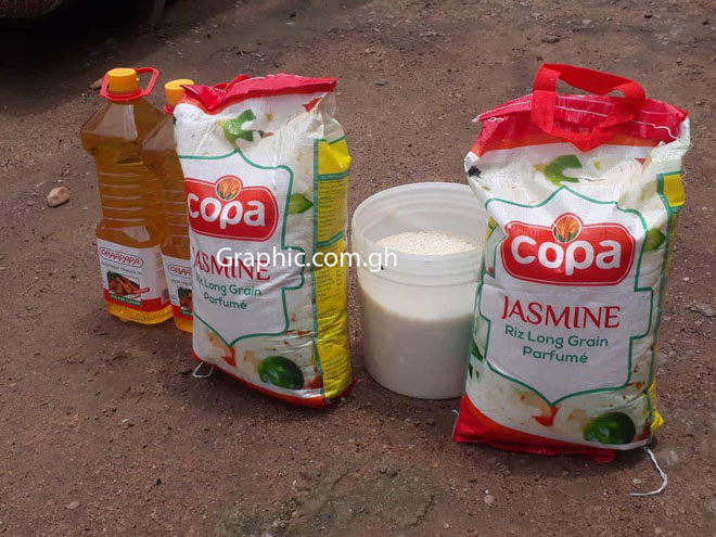   Samples of the cooking oil and rice distributed to flood victims in Wa last weekend. PICTURES BY MICHAEL QUAYE