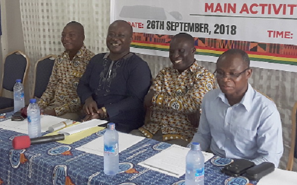 Mr Peter Sarpong(first from right) and Mr Peter Achampong, Regional Manager of the GTA and other staff at the programme
