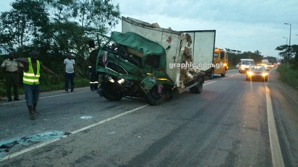 Two dead, dozens injured after passenger bus collides with container.
