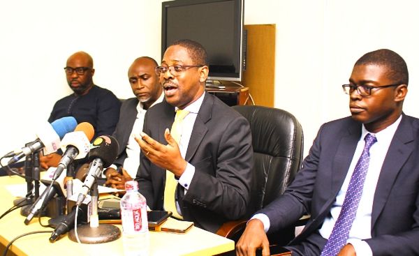 Rev Daniel Ogbarmey Tetteh (right), Director General, Securities Exchange Commission (SEC), speaking at the press briefing. Those with him are Mr Alex Asiedu (2nd left), President, Ghana Securities Industry Association (GSIA) Governing Council, and Mr Kisseih Anthonio, Member, GSIA Governing Council. Picture: NII MARTEY M. BOTCHWAY