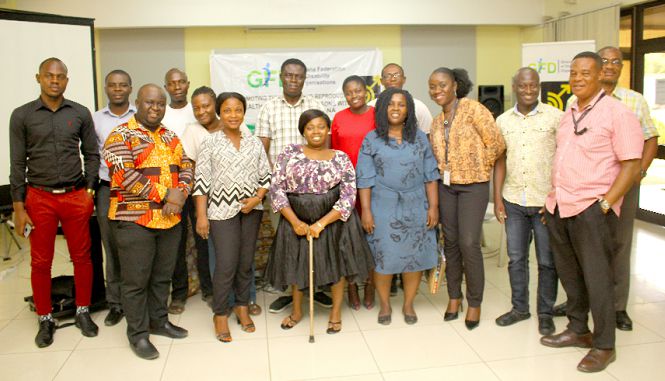 Mr Archibald Adams (2nd left), a Consultant to the Ghana Federation of Disability Organisation together with some officials of the Federation and some participants after the training. Picture: NII MARTEY M. BOTCHWAY