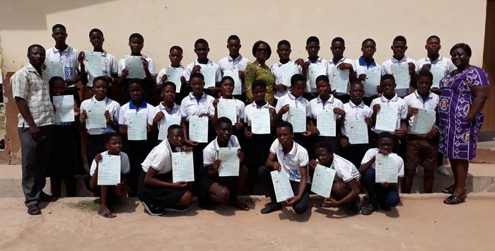 Ms Mintah (extreme right), Mrs Tachie-Menson (middle) and Mr Abban, (extreme left) with the beneficiaries.