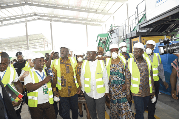 Mr Michael Padi Tuwor (with microphone), acting Managing Director of Accra Compost and Recycline Plant, conducting dignitaries round the plant. Those with them are Mr Mohammed Ibrahim Awal (3rd left), Dr Joseph Siaw Agyepong (2nd right) and Mohammed Adjei Sowah (middle), MCE of Accra. 